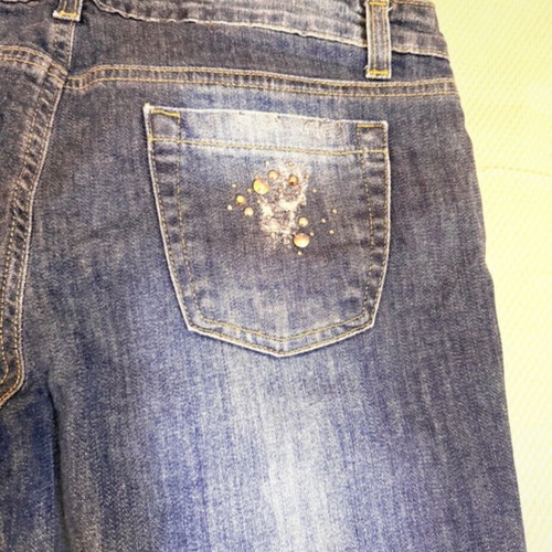 Vintage blue Rococo jeans with studs and rips like new
