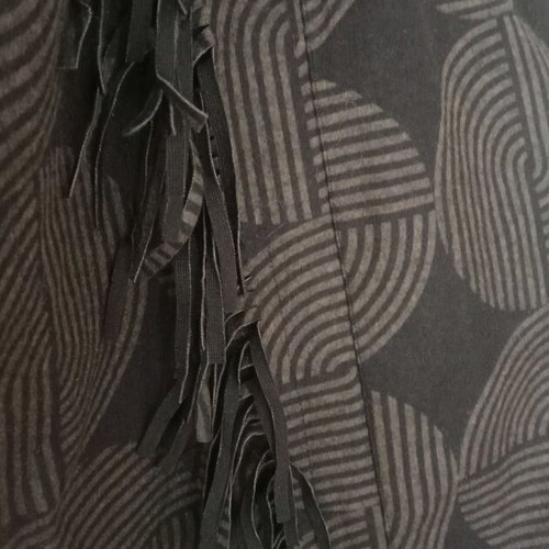 Sleeveless jacket new with fringes and hood in olive color