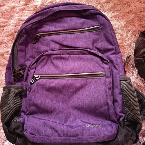 Polo school backpack like new with multiple compartments and waterproof cover