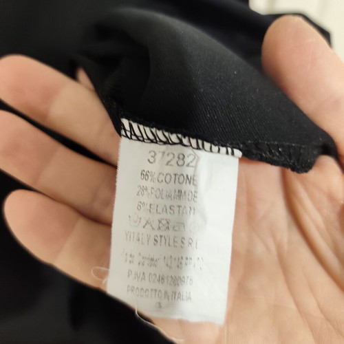 Black midi dress with pockets and asymmetrical design, one size