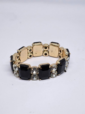 Women's bracelet with stones used, black and gold tone