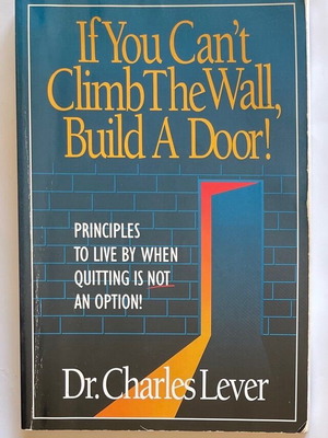 If You Can’t Climb The Wall, Build A Door used book in English