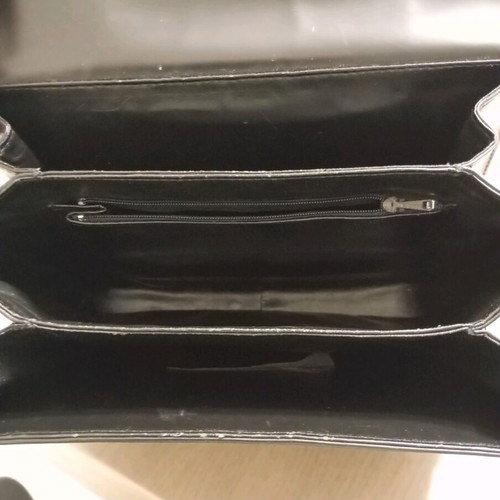 Black leather shoulder bag used with minimal wear
