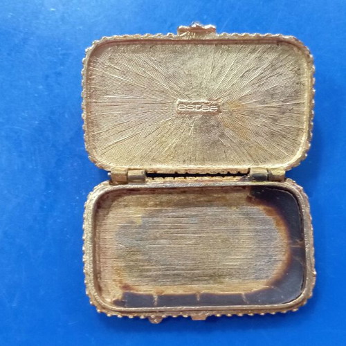 Vintage powder compact used with stone on lid