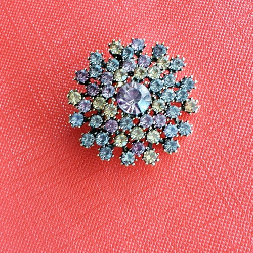 Vintage 60ies flower brooch in gold antique color like new with colorful rhinestones