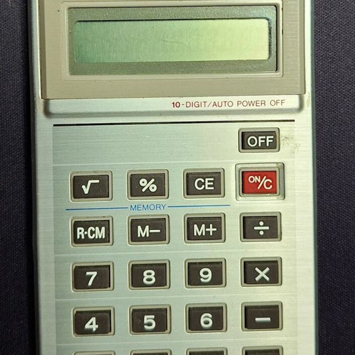 Sharp ElsiMate El-318 calculator used, collectible, fully functional