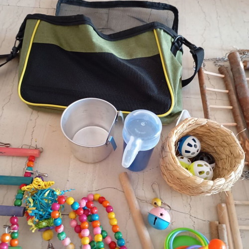 Bird accessories and toys set with transport bag like new