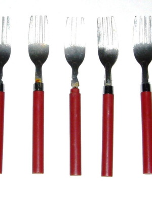 Set of 5 stainless steel forks with ornate handles