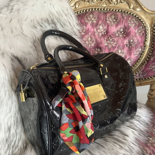 Louis Vuitton old black bag with gold accessories