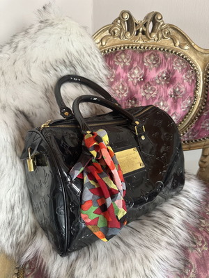 Louis Vuitton old black bag with gold accessories