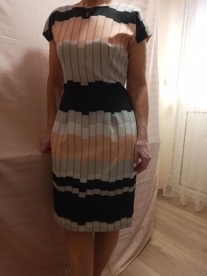 Sleeveless dress like new with lining in interesting design, black and pink