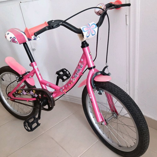 Girl's City Bicycle pink with designs like new, includes training wheels