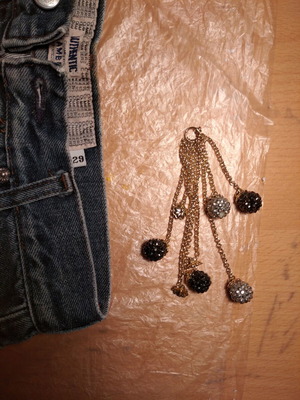 Hanging accessory with chains and balls with rhinestones