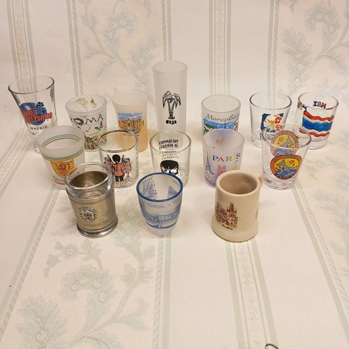 Collection of 87 shot glasses new, promotional and collectible