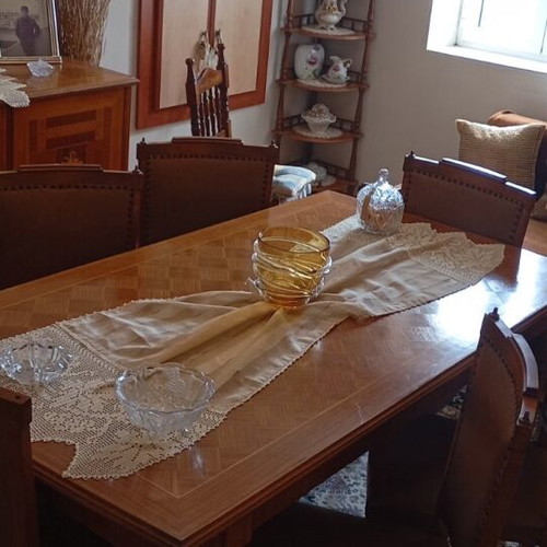 Wooden dining set used with leatherette chairs
