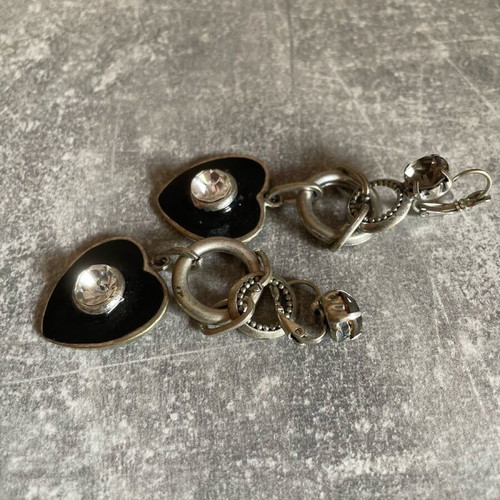 Dangling earrings with black hearts like new