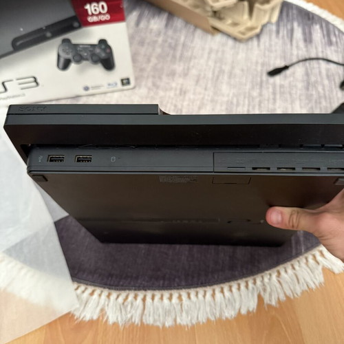 Sony PlayStation 3 Slim 160GB console used with original controller