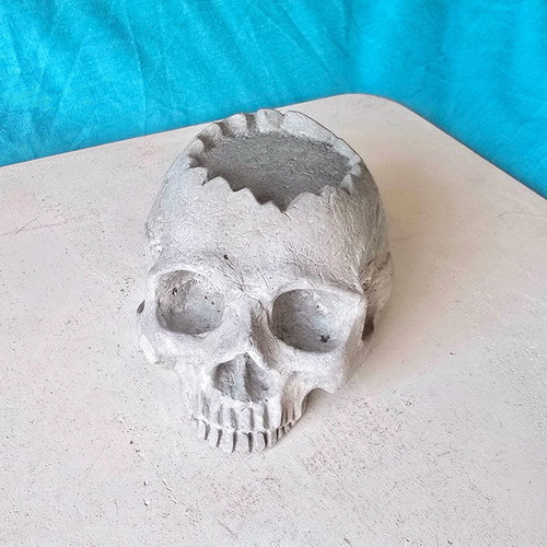 Handmade concrete skull decoration, gothic style