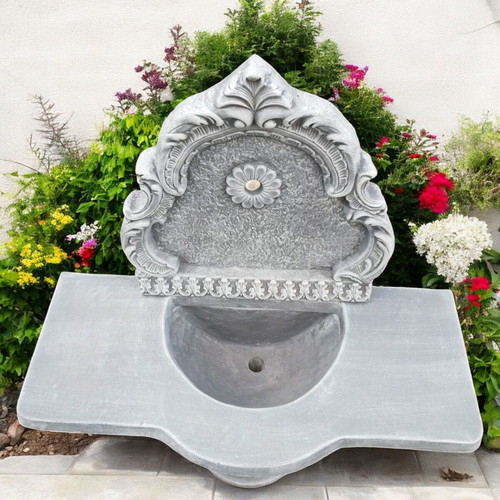Astrea Concrete Garden Wall Fountain with Gray and White Countertop