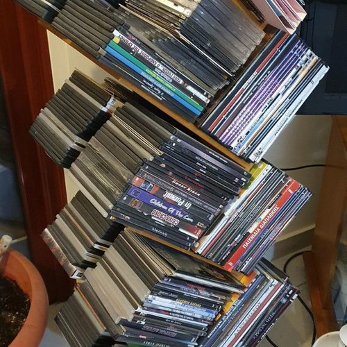 CD/DVD tower used, wooden rotating, black color