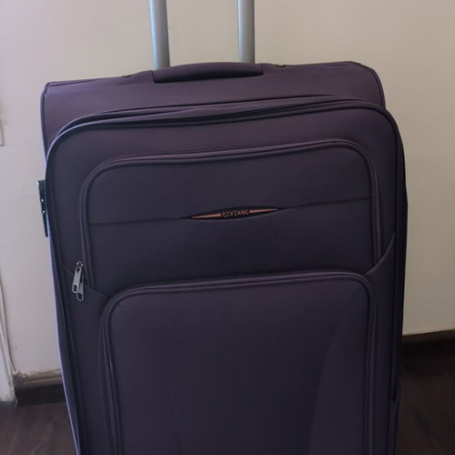 Travel suitcase 28" like new, purple
