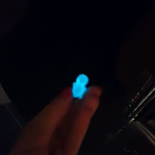 Glowing turtle new, blue, glass-like or hard plastic material