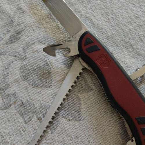 Victorinox Forester pocket knife like new with red and black handles