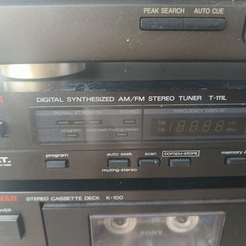 Luxman and Technics stereo system with amplifier and CD player