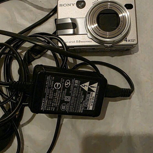 Sony V1 camera refurbished, for parts with charger