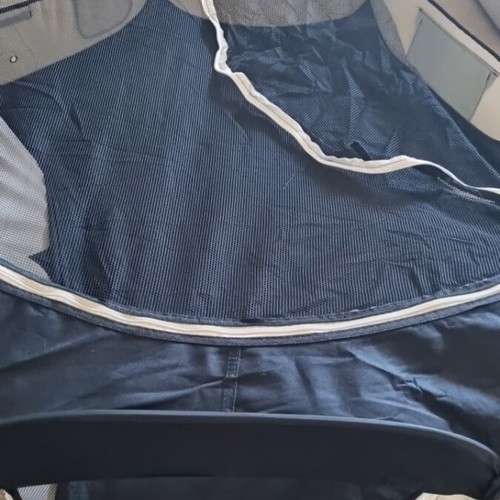 Foldable pet playpen used for dogs and rabbits with mesh cover and two zipper doors