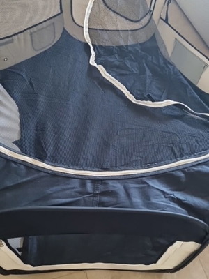 Foldable pet playpen used for dogs and rabbits with mesh cover and two zipper doors