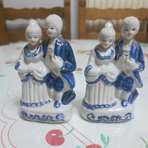 White porcelain figurines like new, set of 2 with blue and gold