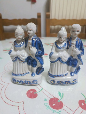 White porcelain figurines like new, set of 2 with blue and gold