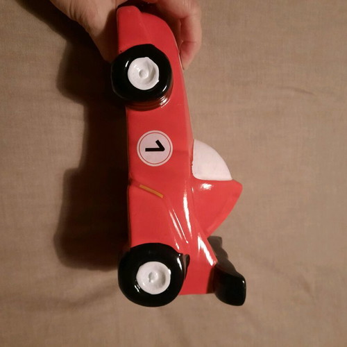 Car-shaped piggy bank like new unused