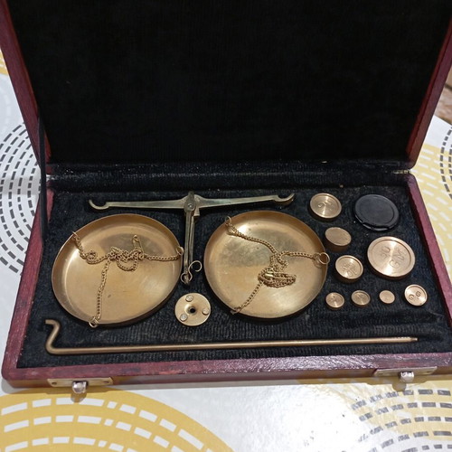 Vintage brass precision scale in wooden case with velvet lining and weights