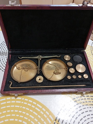 Vintage brass precision scale in wooden case with velvet lining and weights