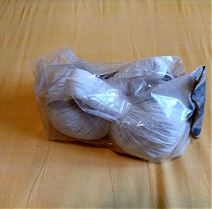 Συσκευασμένα επιθέμετα βοτάνων-'luk pra kob''' από Ταυλάνδη για μασάζ