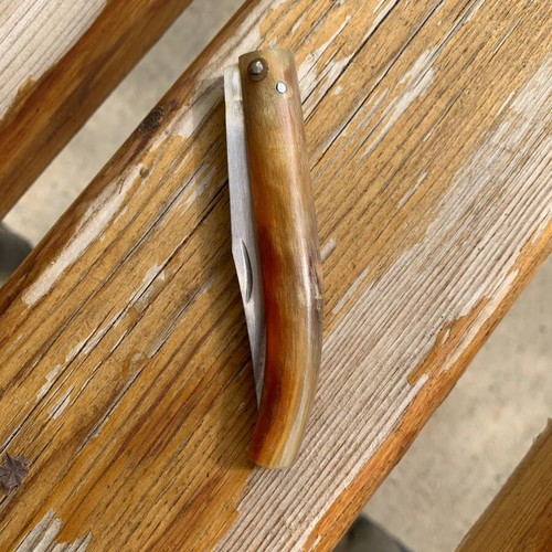 Handmade small folding knife used without blade lock