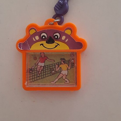 Vintage '80s games keychains with marbles like new