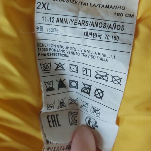 Benetton sleeveless jacket 11-12 years like new, yellow