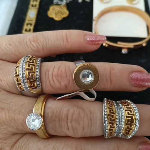 Jewelry set of 10 pieces: 4 rings, 4 bracelets, pendant, earrings