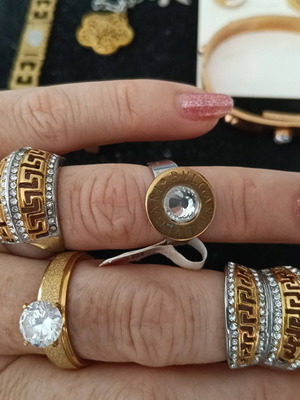 Jewelry set of 10 pieces: 4 rings, 4 bracelets, pendant, earrings