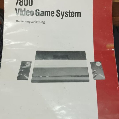 Atari 7800 console used with 2 joysticks and games