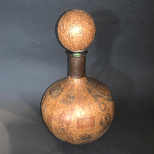 Vintage wine bottle used with Old World map design