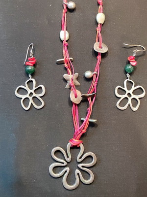 Handmade necklace and earrings set with metal flower like new