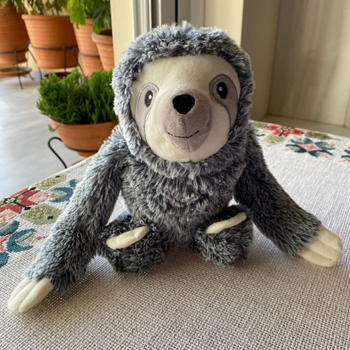Plush animal like new, soft texture, 32 cm length