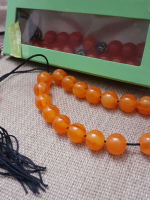 Komboloi set like new with orange and yellow beads, synthetic resin