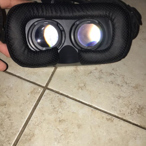 VR headset for mobile with Bluetooth controller used
