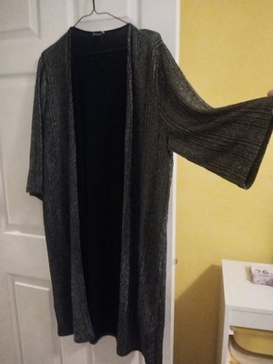 Outerwear with silver and black colors like new