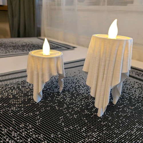 Ghost candles like new, set of 2